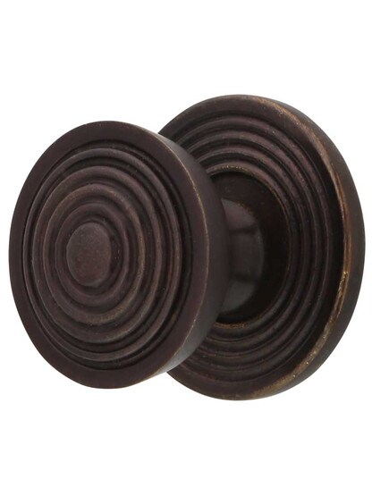 Copernicus Cabinet Knob with Back Plate - 1 1/8 inch Diameter in Dark Antique Bronze.